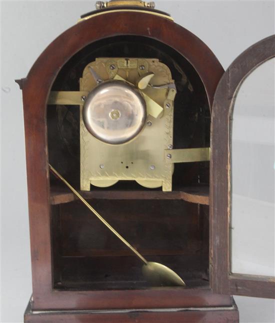 An early 19th century mahogany brass inlaid single pad topped bracket clock, height 19.5in.